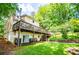 The house features an expansive backyard and multi-level deck at 9018 Lakeview Pkwy, Villa Rica, GA 30180