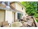 The expansive deck with multiple seating areas and a grill is perfect for outdoor entertaining at 9018 Lakeview Pkwy, Villa Rica, GA 30180