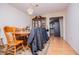 Inviting dining room with wooden table, glass china cabinet, and adjacent kitchen view at 9018 Lakeview Pkwy, Villa Rica, GA 30180