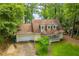 Inviting home with a front porch, attached garage, and beautiful landscaping at 9018 Lakeview Pkwy, Villa Rica, GA 30180
