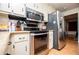A modern kitchen featuring stainless steel appliances and bright countertops at 9018 Lakeview Pkwy, Villa Rica, GA 30180