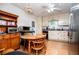 Well-lit kitchen featuring white cabinets, black appliances and bright countertops at 9018 Lakeview Pkwy, Villa Rica, GA 30180