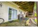 Walkout basement patio with access to upper-level deck and backyard at 9018 Lakeview Pkwy, Villa Rica, GA 30180