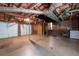 Unfinished basement featuring two garage doors and washer and dryer hookups at 1140 Reading Nw Dr, Acworth, GA 30102