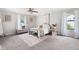 Bright and airy bedroom with ample natural light, neutral walls, and charming decor at 1140 Reading Nw Dr, Acworth, GA 30102