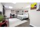 Finished basement bedroom with dark wood flooring and a comfortable sleeping and study space at 1140 Reading Nw Dr, Acworth, GA 30102