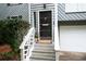 Close up of the front door with a decorative door knocker and a Welcome mat at 1140 Reading Nw Dr, Acworth, GA 30102