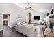 Inviting living room boasts high ceilings, hardwood floors, and a cozy stone fireplace at 1140 Reading Nw Dr, Acworth, GA 30102