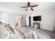 Relaxing main bedroom featuring a flat screen TV, dresser, and ensuite bathroom at 1140 Reading Nw Dr, Acworth, GA 30102