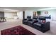 Spacious finished basement featuring a seating area with comfortable recliners and a decorative rug at 1908 Musket Ct, Stone Mountain, GA 30087