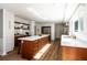 Modern kitchen featuring a large island, stainless steel appliances, and lots of natural light at 1908 Musket Ct, Stone Mountain, GA 30087