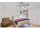 Cozy bedroom with natural light, a comfortable bed, chair, and minimalist decor at 2241 N 16 Hwy, Whitesburg, GA 30185