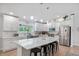 Modern kitchen featuring a marble-top island, stainless appliances, and stylish pendant lighting at 2241 N 16 Hwy, Whitesburg, GA 30185
