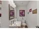 Charming half bathroom with stylish mirror, sink, and tasteful decor at 2241 N 16 Hwy, Whitesburg, GA 30185