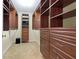 A spacious walk-in closet with custom shelving, drawers, and ample storage for clothing at 260 Waverly Hall Dr, Roswell, GA 30075