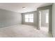 Spacious bedroom with carpet and view of a large window at 5018 Upper Elm St, Atlanta, GA 30349