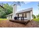 Backyard featuring a deck and manicured lawn perfect for entertaining at 5315 Bentley Hall Dr, Alpharetta, GA 30005