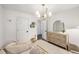 Bright bedroom featuring a bed, ample space, and a dresser with decorations at 5315 Bentley Hall Dr, Alpharetta, GA 30005