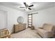 Bright bedroom with neutral color palette, circle mirror and a barn door at 5315 Bentley Hall Dr, Alpharetta, GA 30005