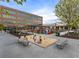 Outdoor community space with a large sandbox, seating, and visible nearby buildings at 5315 Bentley Hall Dr, Alpharetta, GA 30005