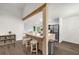Kitchen island with seating and stainless appliances, open floor plan at 5315 Bentley Hall Dr, Alpharetta, GA 30005
