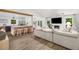 Open-concept living room flowing into the kitchen, perfect for entertaining guests at 5315 Bentley Hall Dr, Alpharetta, GA 30005