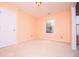 Cozy bedroom with wall-to-wall carpet, natural light, and neutral paint color at 1015 Buckeye Ln, Villa Rica, GA 30180