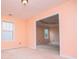 Open bedroom showcases natural light, plush carpet, and an open doorway at 1015 Buckeye Ln, Villa Rica, GA 30180