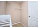 Walk-in closet with carpet flooring and built-in white shelving at 1015 Buckeye Ln, Villa Rica, GA 30180