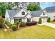 Beautiful home featuring a well-maintained lawn and a spacious two-car garage at 1015 Buckeye Ln, Villa Rica, GA 30180