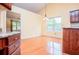 Kitchen boasts hardwood floors and granite counters, offering a blend of style and functionality at 1015 Buckeye Ln, Villa Rica, GA 30180
