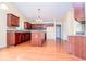 Spacious kitchen with an island, stainless steel appliances, and hardwood floors at 1015 Buckeye Ln, Villa Rica, GA 30180