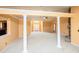 Bright living room showcasing an open layout, decorative columns and view of the home's entry at 1015 Buckeye Ln, Villa Rica, GA 30180