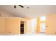 Bright living room features a high ceiling, natural light and open access to the entrance at 1015 Buckeye Ln, Villa Rica, GA 30180