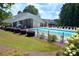 A community pool area offers chairs and tables for warm weather relaxation at 1015 Buckeye Ln, Villa Rica, GA 30180