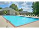A sparkling community pool awaits residents in this scenic backyard setting at 1015 Buckeye Ln, Villa Rica, GA 30180