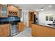 Modern kitchen featuring stainless appliances, wooden cabinets, and a wine cooler at 1384 N Crossing Ne Dr, Atlanta, GA 30329