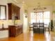 Charming dining area with custom chandelier, large windows, and stylish decor at 154 Gold Leaf Trail Trl, Powder Springs, GA 30127