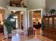 Elegant foyer with hardwood floors, decorative trim, and access to multiple rooms at 154 Gold Leaf Trail Trl, Powder Springs, GA 30127