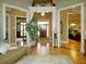 Elegant foyer featuring hardwood floors, white trim and multiple entryways at 154 Gold Leaf Trail Trl, Powder Springs, GA 30127