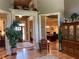 Spacious foyer featuring hardwood floors, tall ceilings, and a view into other rooms at 154 Gold Leaf Trail Trl, Powder Springs, GA 30127