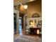 Welcoming foyer with hardwood floors, decorative molding, and a stylish console table at 154 Gold Leaf Trail Trl, Powder Springs, GA 30127