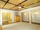 Open concept living room with unique ceiling design and access to additional rooms at 154 Gold Leaf Trail Trl, Powder Springs, GA 30127