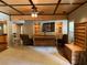 Spacious living room with custom ceiling, built-in shelving, comfortable seating and rustic decor at 154 Gold Leaf Trail Trl, Powder Springs, GA 30127