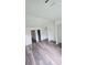 Clean bedroom with closet space and attached bathroom entrance at 6662 Witherington Ct, Norcross, GA 30093