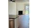 Open living space with fireplace and access to outside at 6662 Witherington Ct, Norcross, GA 30093