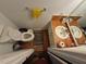 Small bathroom with a toilet, sink, and limited storage space at 964 Glynn Oaks Dr, Clarkston, GA 30021