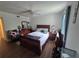 Spacious bedroom with wood-look flooring, a large bed, and ample natural light at 964 Glynn Oaks Dr, Clarkston, GA 30021