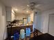 Efficient kitchen featuring ample cabinetry and a breakfast bar, perfect for casual dining at 964 Glynn Oaks Dr, Clarkston, GA 30021