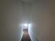 Clean stairwell leading to the upper level of the home at 964 Glynn Oaks Dr, Clarkston, GA 30021